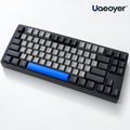 Uaeoyer™ Compact Mechanical Keyboard with Graphite Keycaps & Blue Accent