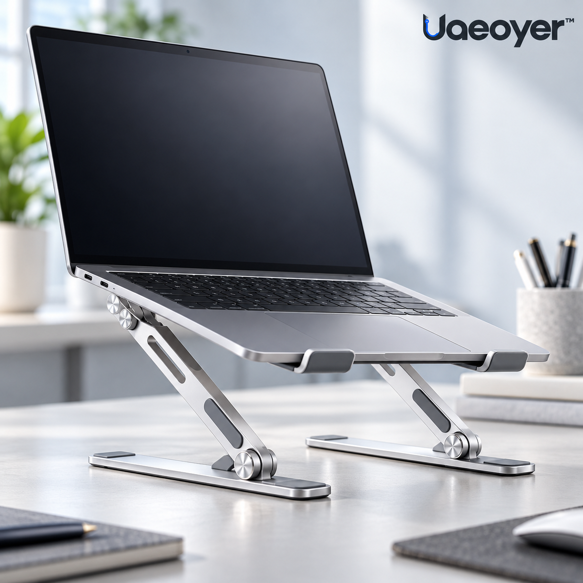 Uaeoyer™ Adjustable Folding Aluminum Laptop Stand — Silver